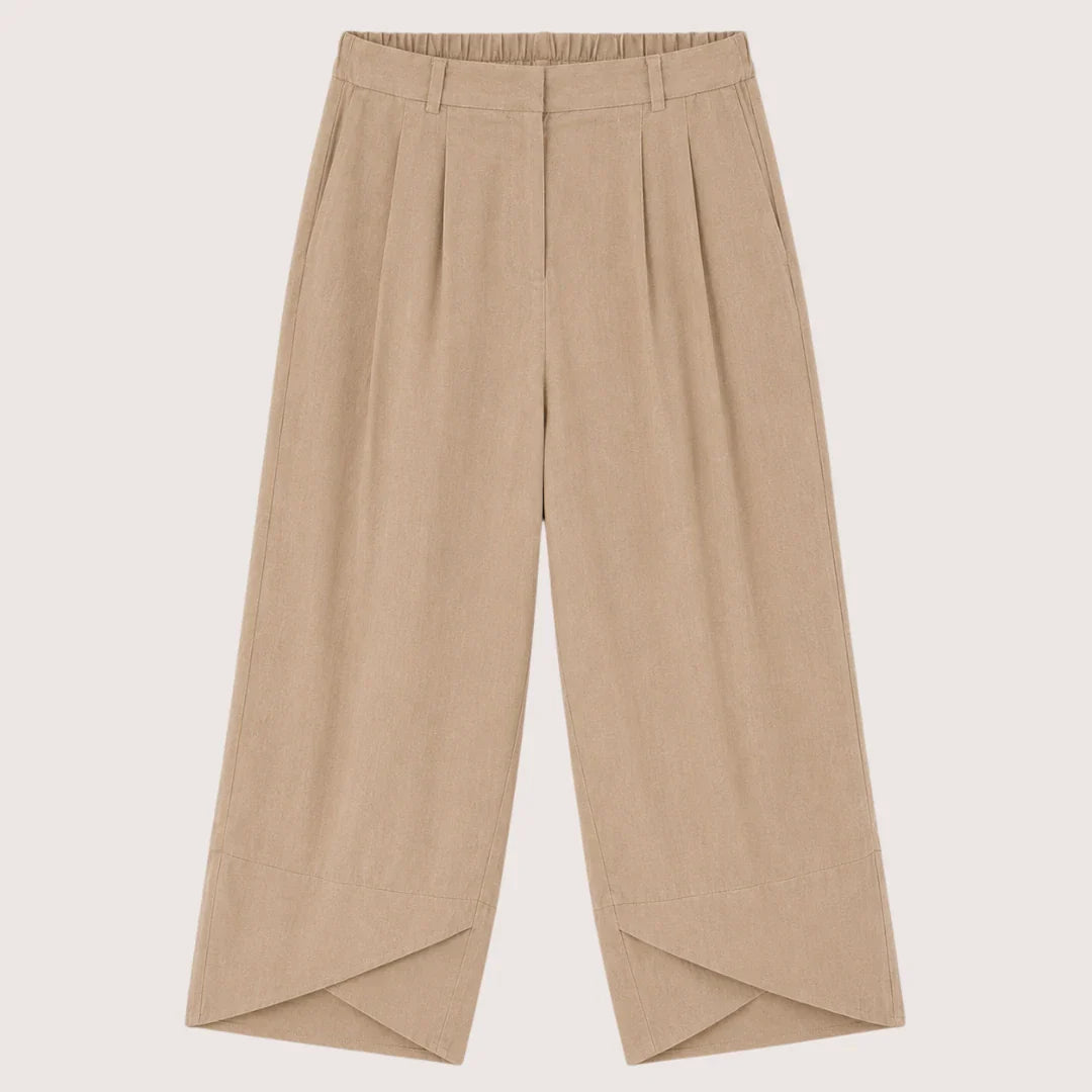 Beige wide-leg pants on a light beige background